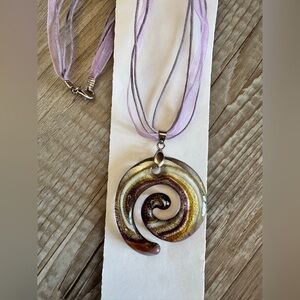 Glass Spiral Pendant Necklace with Purple gold silver foiled glass Ribbon cord.